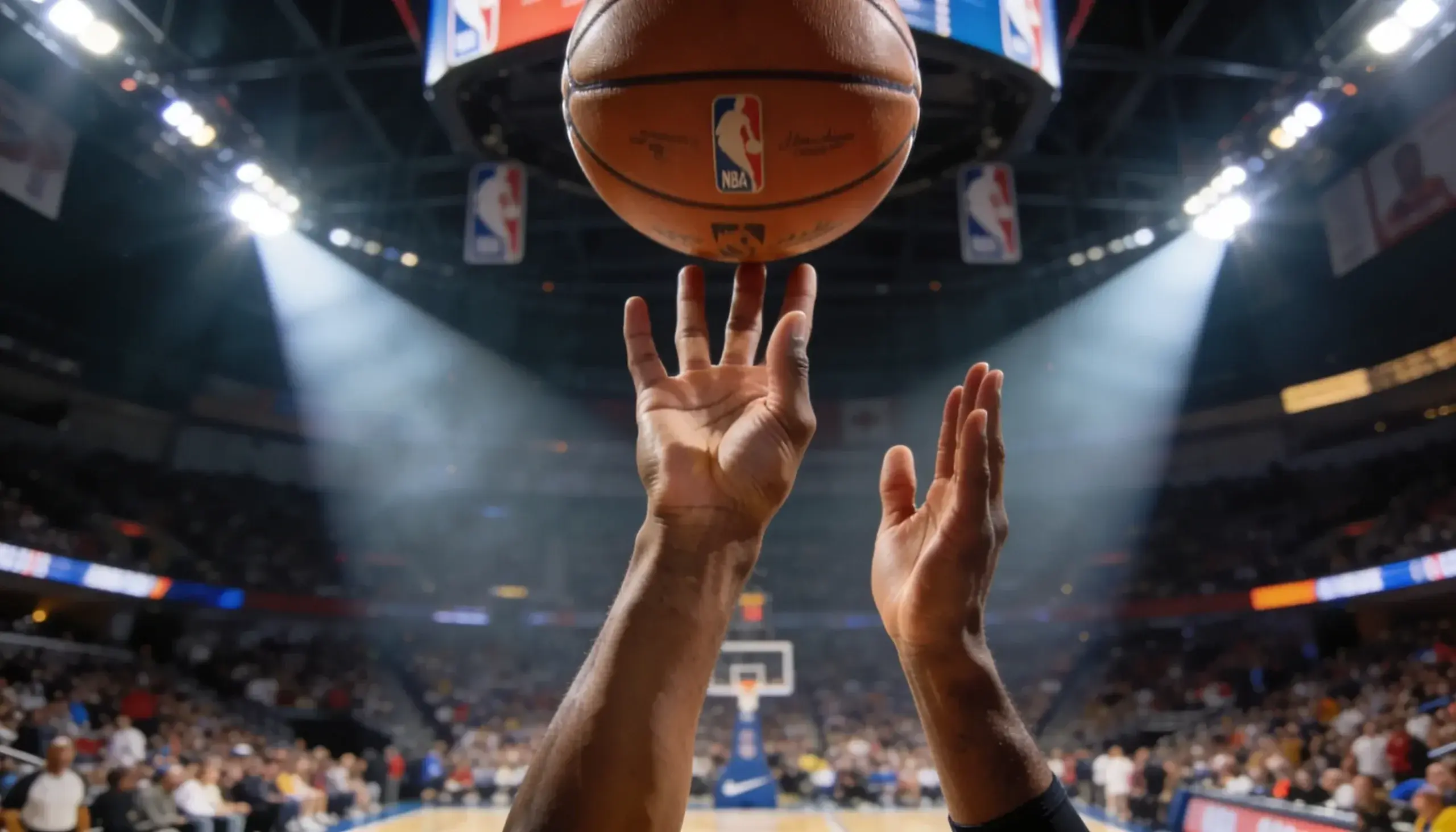 Close-up of a basketball player shooting a free throw in a packed NBA arena